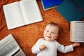 One year old baby with spectackles and books Royalty Free Stock Photo