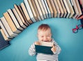 One year old baby with spectackles and books Royalty Free Stock Photo