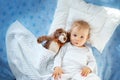 One year old baby with a teddy bear Royalty Free Stock Photo