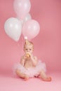 One Year Old Birthday Girl Eating a Cupcake Royalty Free Stock Photo