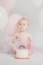 One Year Old Birthday Portraits With Smash Cake and Balloons Royalty Free Stock Photo