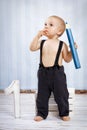 One year old boy with big crayon Royalty Free Stock Photo