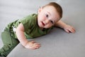 One-year-old boy tries to climb Royalty Free Stock Photo