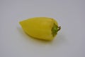 One yellow bell pepper, not hot, sweet crunchy pepper located on a white background. Royalty Free Stock Photo