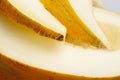 One yellow honeydew melon slice without seeds Royalty Free Stock Photo