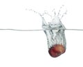One yellow peach drop in water with splashes Royalty Free Stock Photo