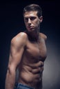 One young adult man, Caucasian, fitness model, muscular body, sh