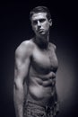 One young adult man, Caucasian, fitness model, muscular body, sh