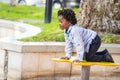 One young black children enjoy time having fun at the playground in city park. Little guy playing in outdoor leisure activity Royalty Free Stock Photo