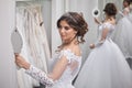one young bride, looking at self in mirror, Royalty Free Stock Photo