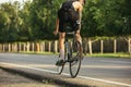 Young male cyclist riding a road bike in summer day. Action, motion concept Royalty Free Stock Photo