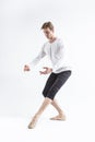One Young, handsome, sporty and athletic ballet dancer with Ballanced Hands on White Royalty Free Stock Photo