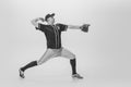 Portrait of young man, college student, baseball player, pitcher training, serving ball. black and white photography Royalty Free Stock Photo