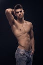 One young man, fit abs body shirtless jeans Royalty Free Stock Photo