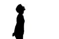 One young teenager boy or girl looking up silhouette Royalty Free Stock Photo