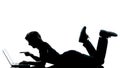 One young teenager boy girl silhouette computer computing lapto Royalty Free Stock Photo
