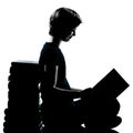 One young teenager silhouette boy or girl reading