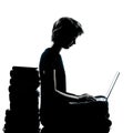 One young teenager silhouette computer computing Royalty Free Stock Photo