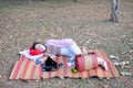 One young woman sleep on the mat with accessories Royalty Free Stock Photo