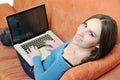 One young woman working on laptop