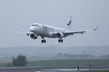 Finnair Oneworld landing on foggy runway