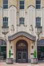 ONG Building - One of the first zigzag art deco style buildings in Tulsa with hanging ornate entrance canopy and pink