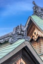 Onigawara (goblin mask tile) and Gegyo (gable) of Kanchi-in Shingon Buddhist temple located in Kyoto, Japan