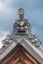 Onigawara (Ogre goblin tile) and Gegyo (gable) of Kanchi-in Shingon Buddhist temple located in Kyoto, Japan.