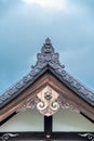 Onigawara (Ogre Tile) and Gegyo roof ornaments at Shogan-ji temple. Kyoto, Japan.