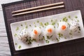 Onigiri rice balls close-up on a plate. Horizontal top view Royalty Free Stock Photo