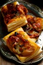 Onion and cheese puff tarts.style rustic.selective focus