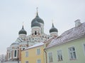 Towers of the Orthodox cathedral over the roofs of traditional houses in Tallinn