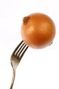 Onion on fork Royalty Free Stock Photo