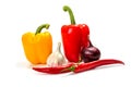 Onion, garlic, chili peppers and red, yellow and green bell pepper on white background Royalty Free Stock Photo
