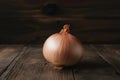 Onion on kitchen table, versatile vegetable ready for culinary creations