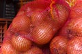 Onion, onion pictures in big bags, winter onions paintings, onion and vegetables in large nets