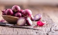 Onion. Red onions on very old oak wood board Royalty Free Stock Photo