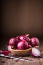 Onion. Red onions on very old oak wood board Royalty Free Stock Photo