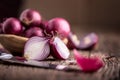 Onion. Red onions on very old oak wood board Royalty Free Stock Photo