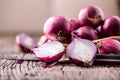 Onion. Red onions on very old oak wood board Royalty Free Stock Photo