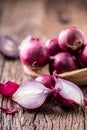 Onion. Red onions on very old oak wood board Royalty Free Stock Photo