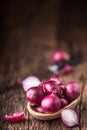 Onion. Red onions on very old oak wood board Royalty Free Stock Photo