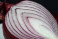 Onion refines so many dishes in the kitchen Royalty Free Stock Photo
