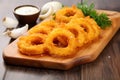 onion rings on a wooden chopping board