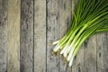 Onion welsh on wood plank