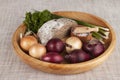 Onions, brown bread wooden tray with parsley and salt and celery Royalty Free Stock Photo