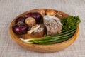 Onions, brown bread wooden tray with parsley and salt and celery Royalty Free Stock Photo