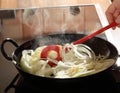 Onions cooking in a frying pan