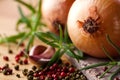 Onions, peppercorns and fresh rosemary