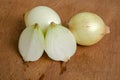 Onions On Ply Board Surface Royalty Free Stock Photo